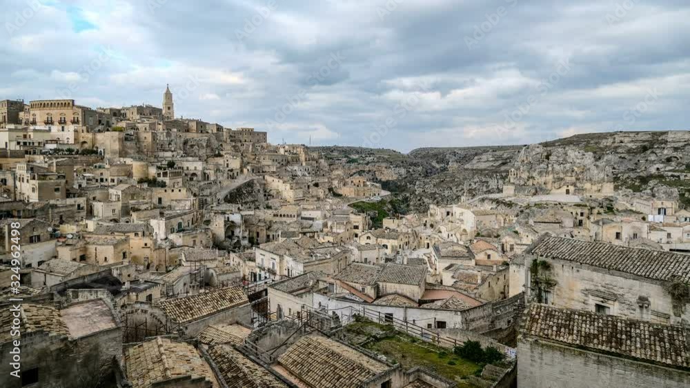 High view of town architecture skyline of matera,italy,people motion timelapse High view of town architecture skyline of matera,italy,people motion timelapse