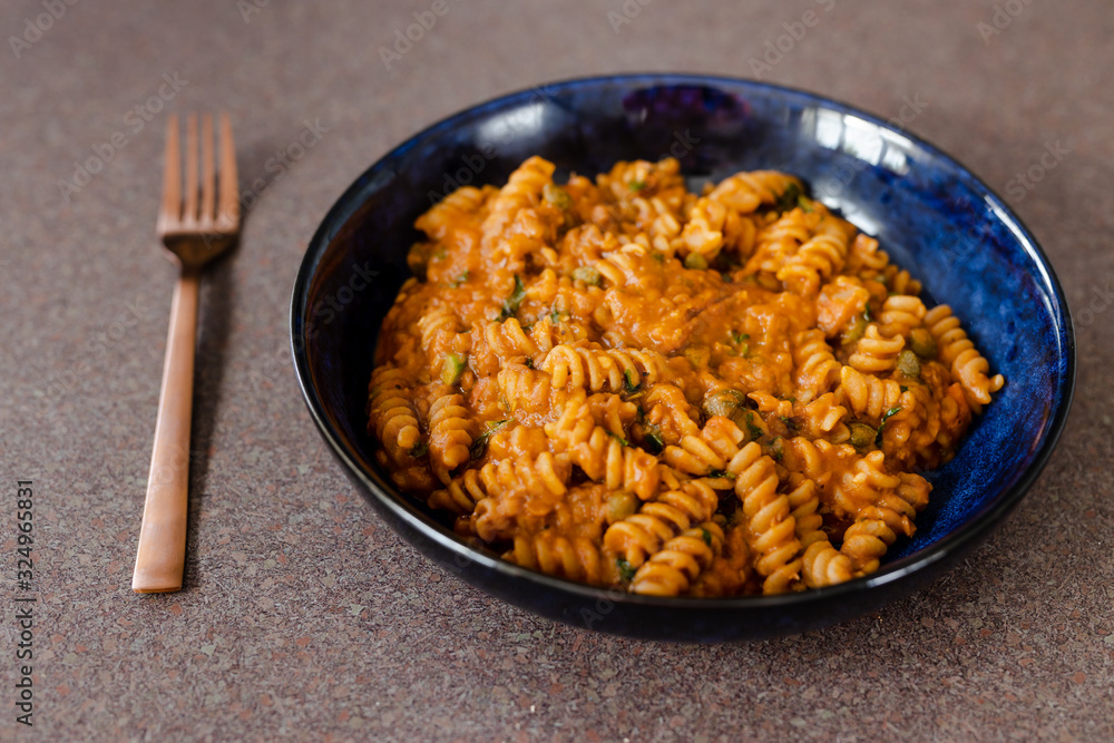 healthy plant-based food, lentil and tomato sauce pasta