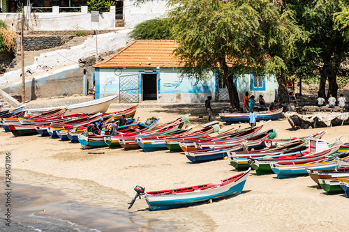 Colorful traditional wooden fishing boats on the beach of Tarrafal in Cape Verde