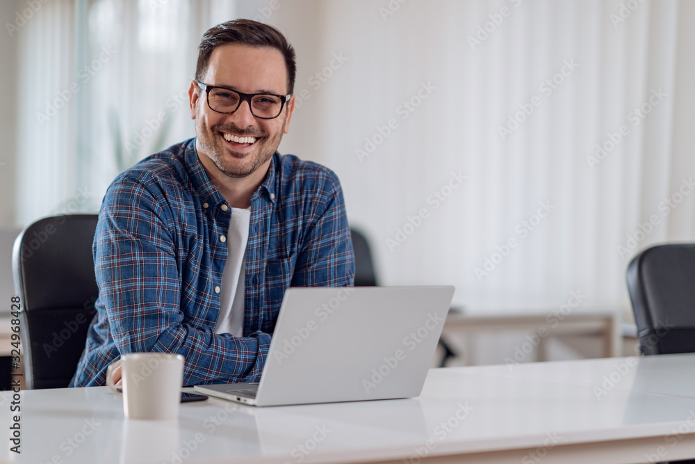 Portrait of businessman working in the office Portrait of businessman working in the office