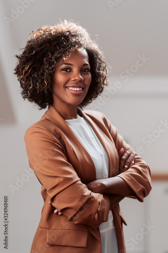 фотографія Portrait of young cheerful african american businesswoman