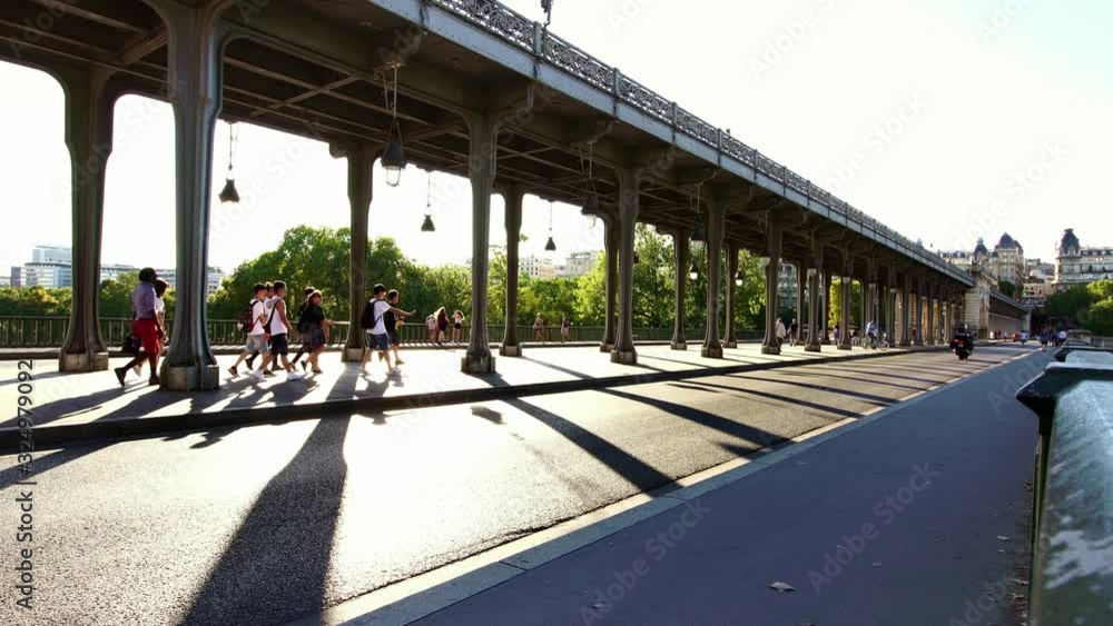 Popular tourist bridge in Paris, sunset light. Summer tourism & romantic honeymoon city destination in Europe. Popular tourist bridge in Paris, sunset light. Summer tourism & romantic honeymoon city destination in Europe.