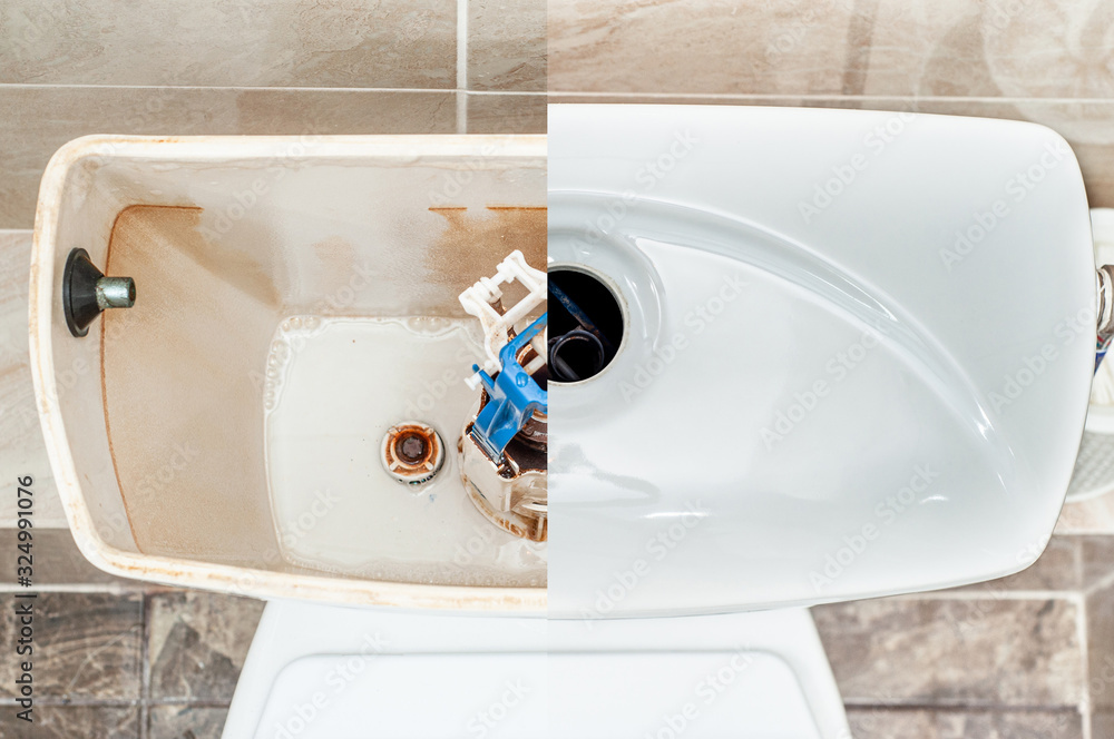 Section view of an empty clean toilet flush tank top view. Stock Photo