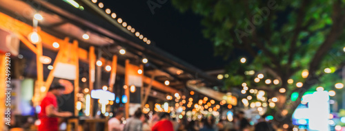 Obraz na płótnie Crowded Traveler in pub at Thailand blur