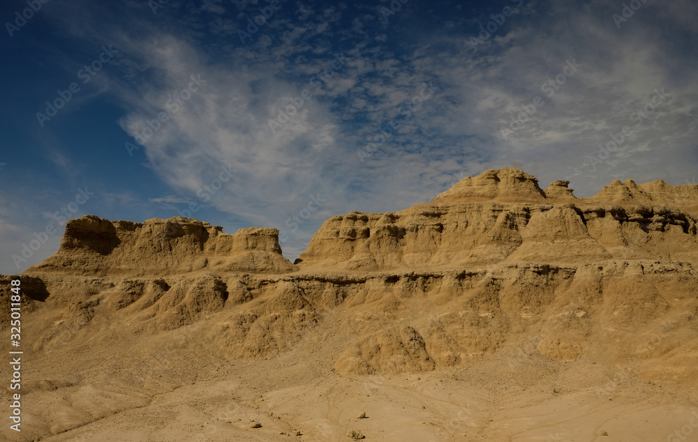 Blue Skies and Rugged Landscapes of the Badlands in South Dakota