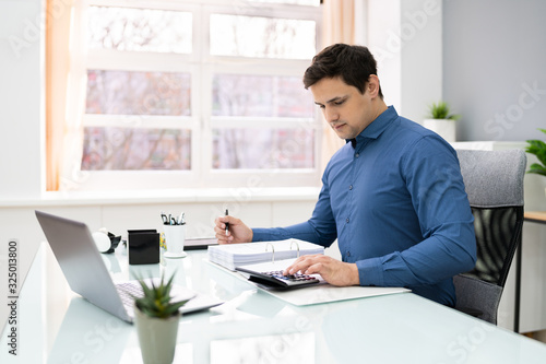 Accountant Working At The Office photo