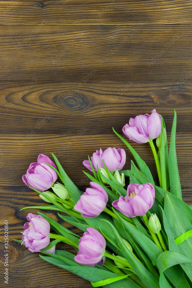 bouquet of pink tulips on wooden background bouquet of pink tulips on wooden background
