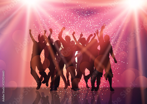 Party crowd with spotlights and confetti