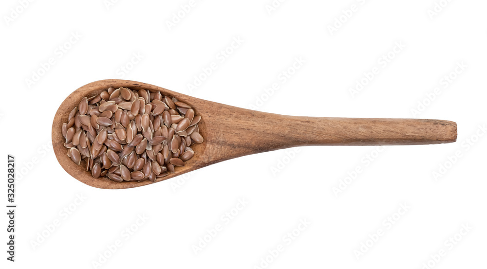 Linseeds or flax seed on a brown wooden spoon seen directly from above and isolated on white background Linseeds or flax seed on a brown wooden spoon seen directly from above and isolated on white background