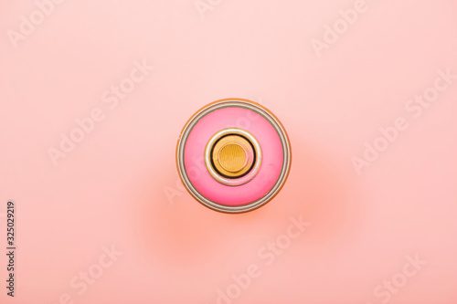 pink colored spray can