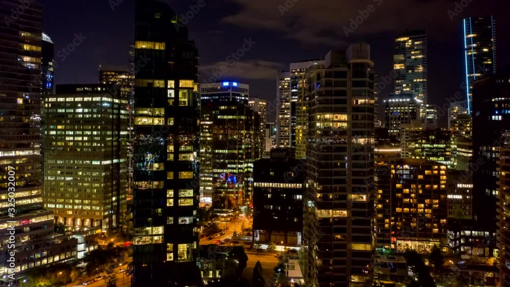 Vancouver BC Canada Aerial v3 Low flying hyperlapse looking at cityscape skyline at night - August 2019 Vancouver BC Canada Aerial v3 Low flying hyperlapse looking at cityscape skyline at night - August 2019