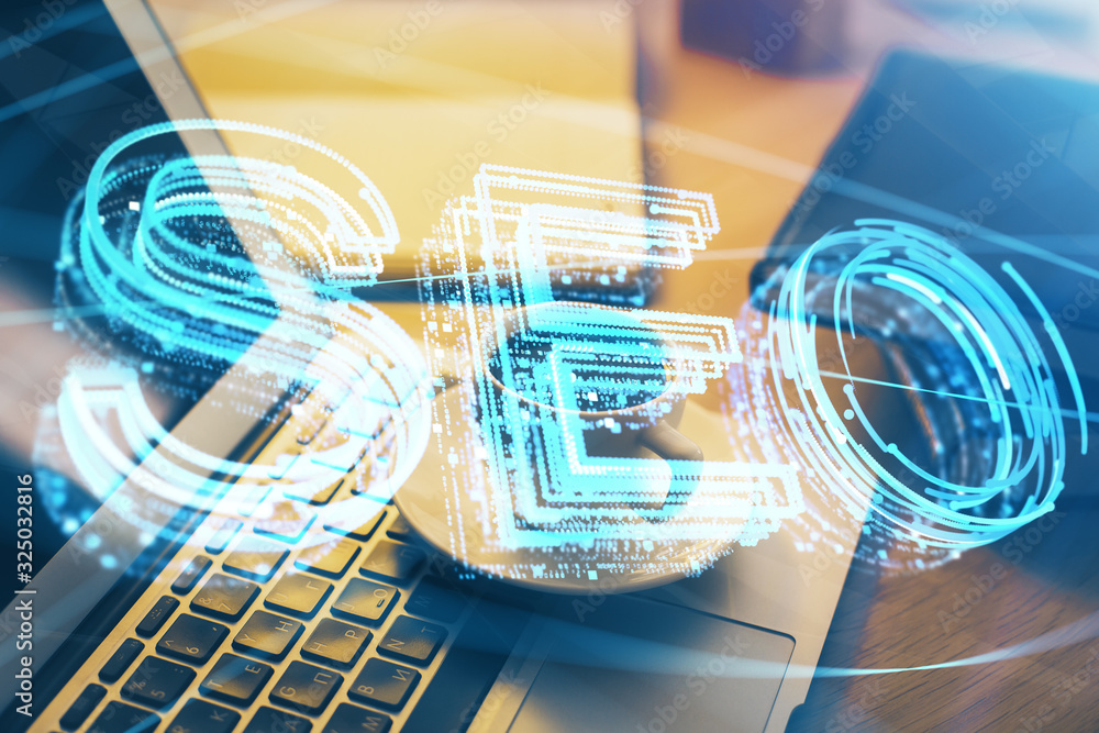 Double exposure of table with computer and seo drawing hologram. Search optimization concept. Double exposure of table with computer and seo drawing hologram. Search optimization concept.