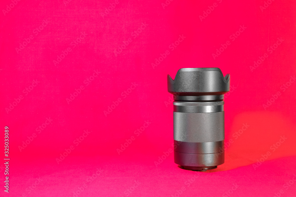 camera lens on a red background camera lens on a red background