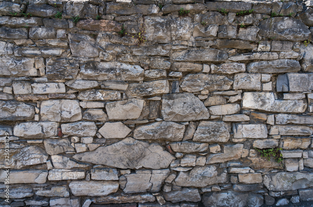 Stone wall texture background. Grey slate rock texture Stone wall texture background. Grey slate rock texture