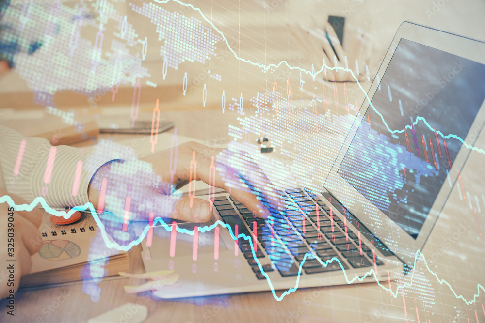Double exposure of stock market graph with man working on laptop on background. Concept of financial analysis. Double exposure of stock market graph with man working on laptop on background. Concept of financial analysis.