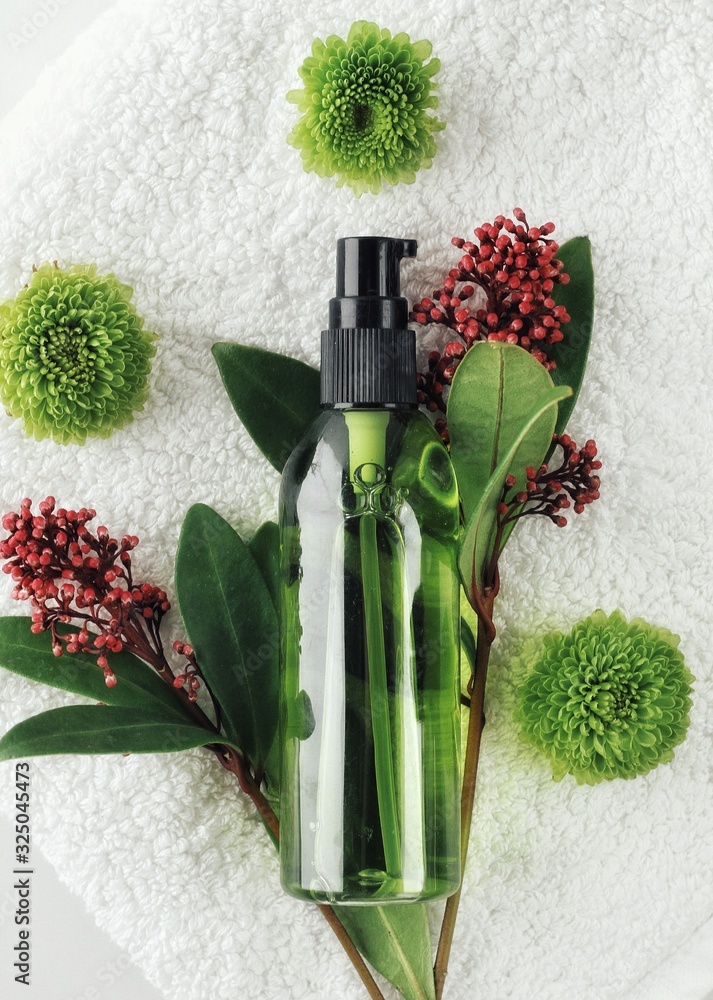 Organic skincare products on minimalistic SPA background with copy space