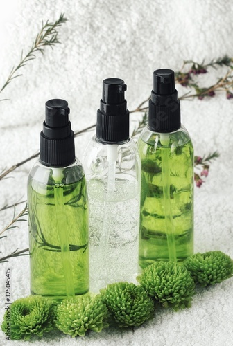 Organic skincare products on minimalistic SPA background with copy space