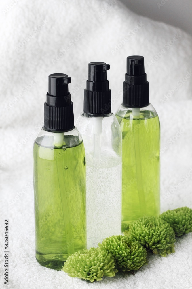 Organic skincare products on minimalistic SPA background with copy space