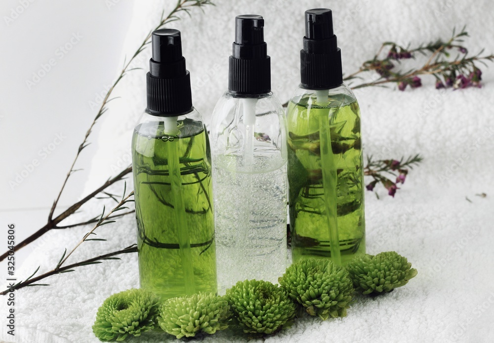 Organic skincare products on minimalistic SPA background with copy space
