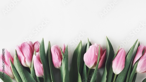 Obraz na płótnie Beautiful spring flowers bouquet with cosmetics for greetings isolated on white w salonie