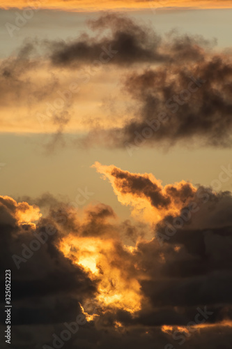 Sunset clouds over Tasman Sea from Waitakere Ranges in West Auckland 