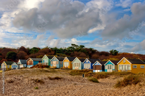 Beach huts at Hengistbury Head near Bournemouth in Dorset, England