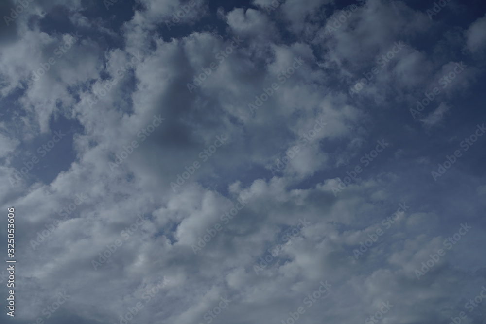 Cloudy evening and morning sky with blue, white deep and grey texture Cloudy evening and morning sky with blue, white deep and grey texture