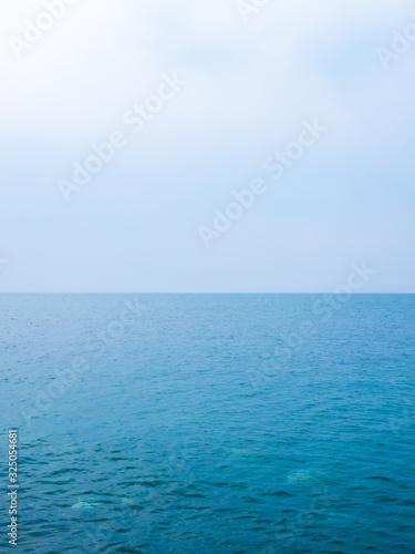 Calm Sea Ocean And Blue Sky Background. High resolution © Andy Shell