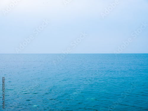 Calm Sea Ocean And Blue Sky Background. High resolution