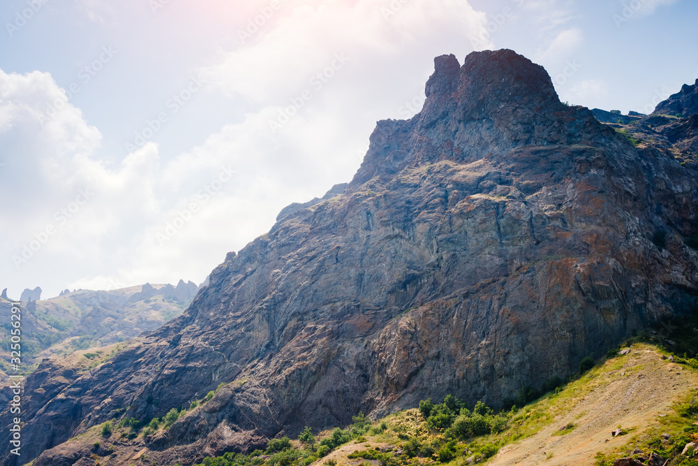 Karadag mountain range in Crimean mountains, an ancient extinct volcano. Karadag mountain range in Crimean mountains, an ancient extinct volcano.
