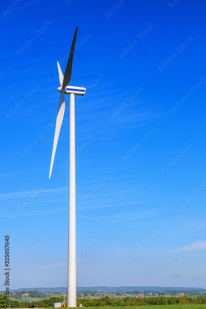 Wind turbines in a beautiful summer landscape