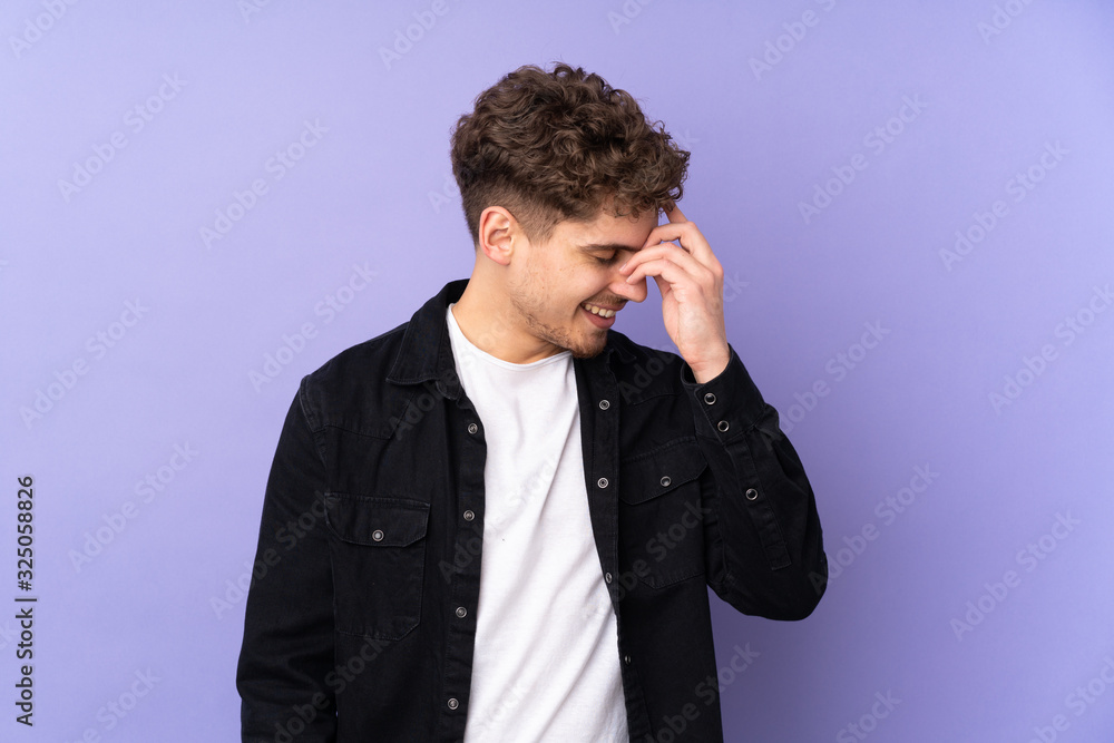 Caucasian man isolated on purple background laughing Caucasian man isolated on purple background laughing