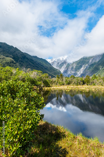 Mountain mirroring in lake New Zealand © Simon