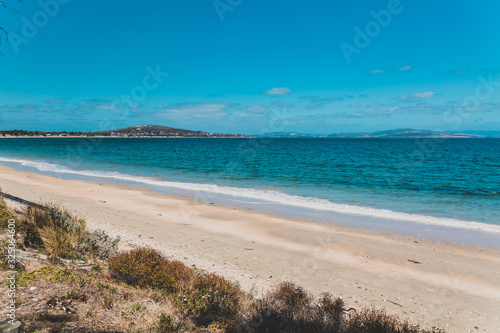 landscape in South Arm Beach near Opossum Bay on a sunny summer day with nobody on the beach