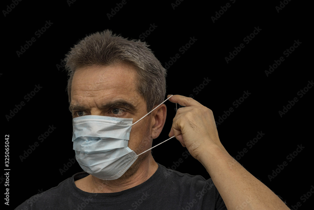 Close up view of man in white face mask. Influenza vi
