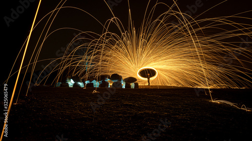 Magical sparkling dolmen / hunebed in the night photo