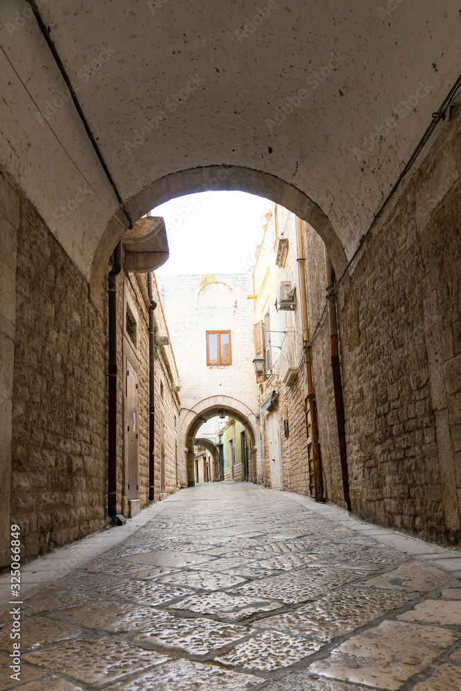 Small alley in Trani, Italy