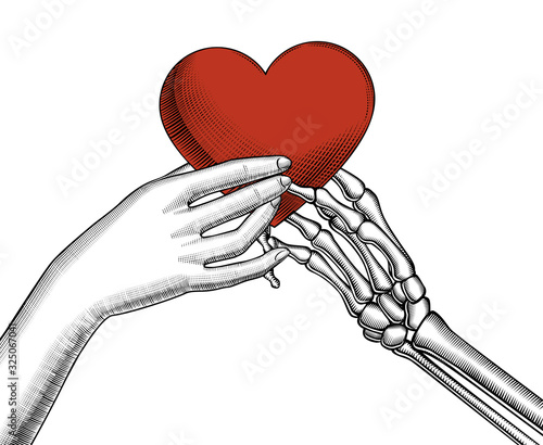 The skeletons hand gives a a red heart to the female hand.