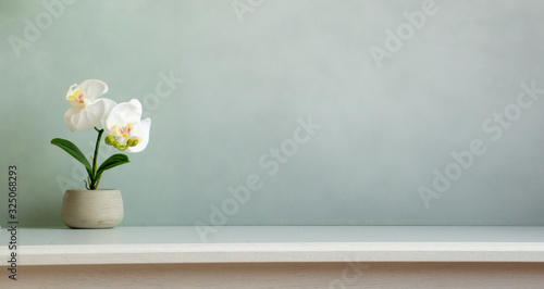 Stylish workplace with copy space, Designer mockup desk work with flower.