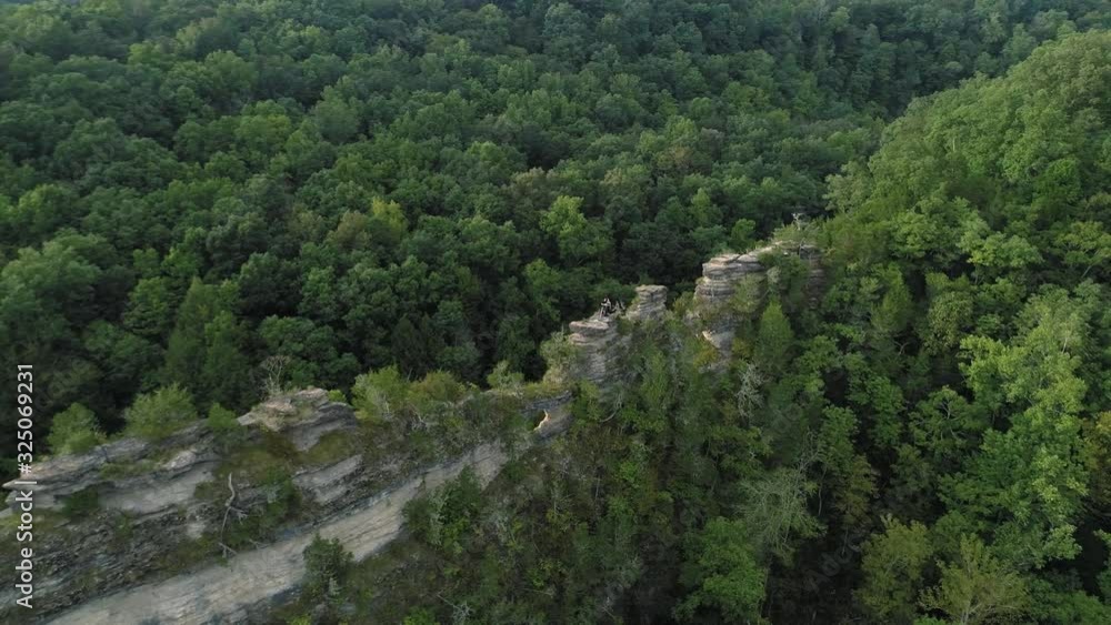 Aerial shot along rocky ridge in green Tennessee hills. Aerial shot along rocky ridge in green Tennessee hills.