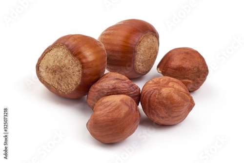 Hazelnut heap, isolated on white background