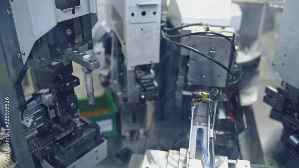 Modern machine at workshop. Shop assembly of electronic components Modern machine at workshop. Shop assembly of electronic components