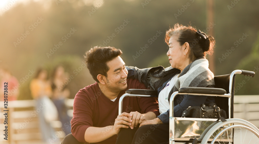 Portrait of Asian senior mother and young man son smile and happy face Portrait of Asian senior mother and young man son smile and happy face