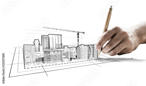 City civil planning and real estate development - Architect people looking at abstract city sketch drawing to design creative future city building. Architecture dream and ambition concept. photo