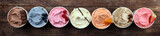 Various of ice cream flavor with fresh blueberry, strawberry, almond, chocolate, vanilla setup on rustic background . Summer and Sweet cold ice cream
