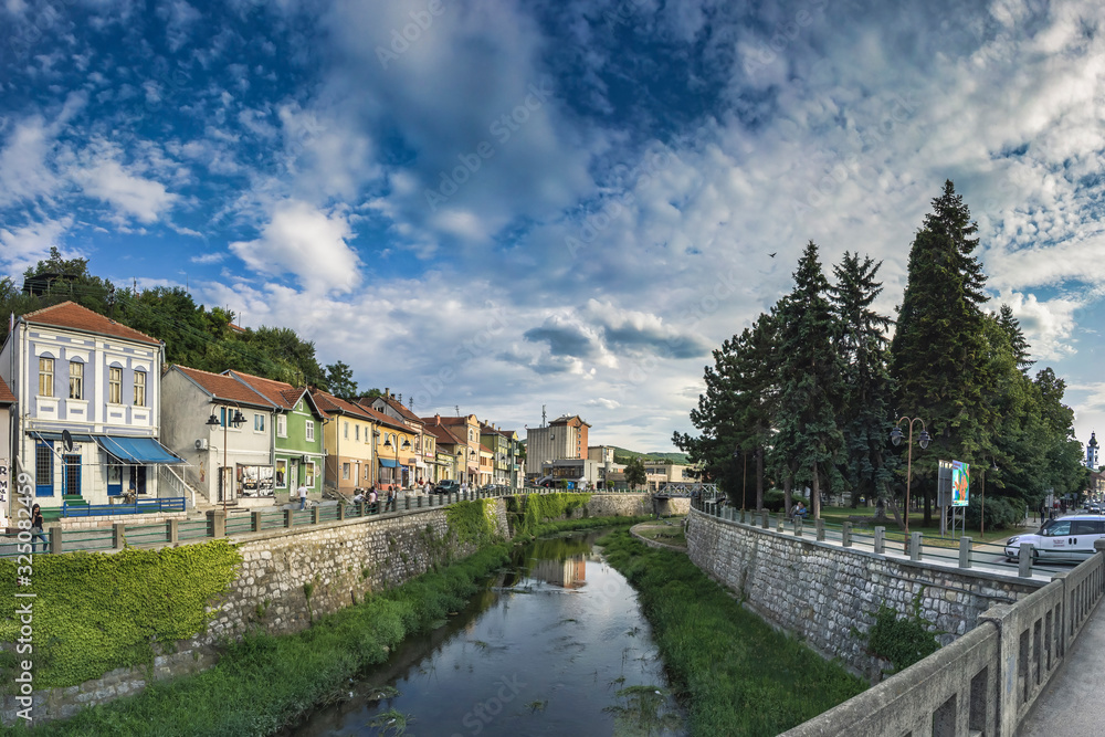 Old downtown of Knjazevac city in eastern Serbia. Beautiful view from the central bridge on the Timok river, HDR stitched panorama. 
