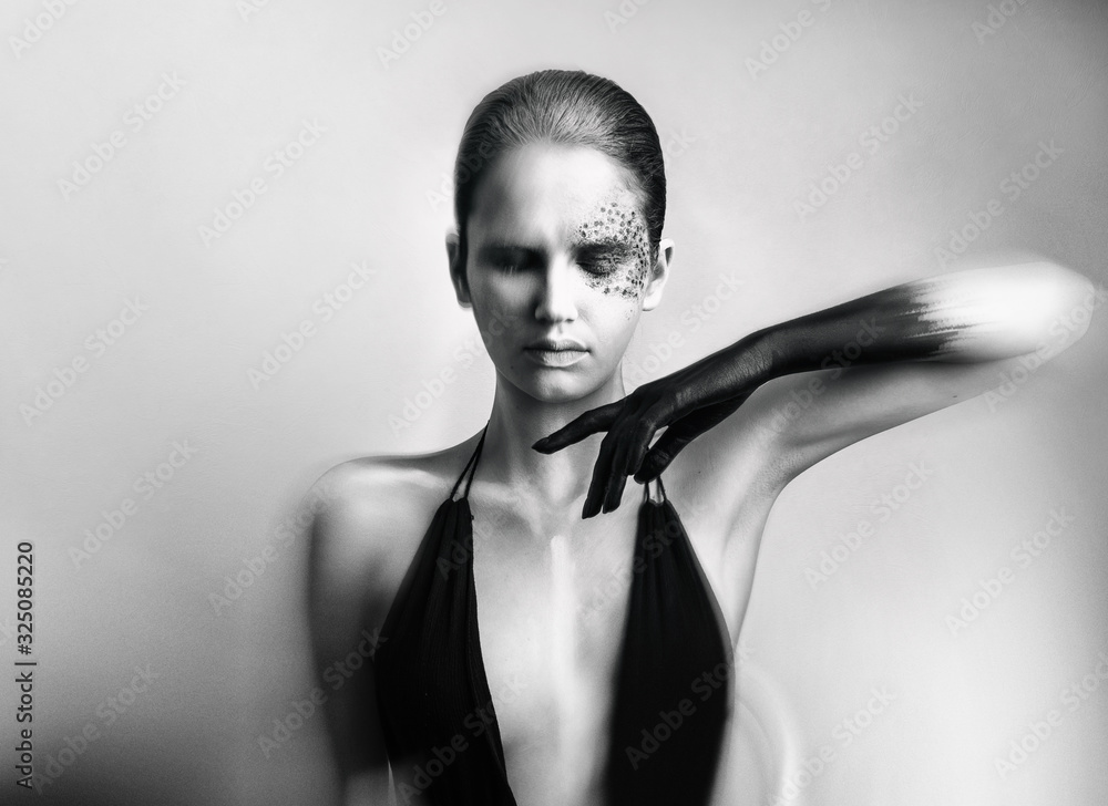 Fototapeta Portrait of young beautiful woman. Black and white horror concept.