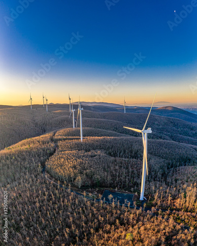 Aerial photos of a wind farm after sunrise