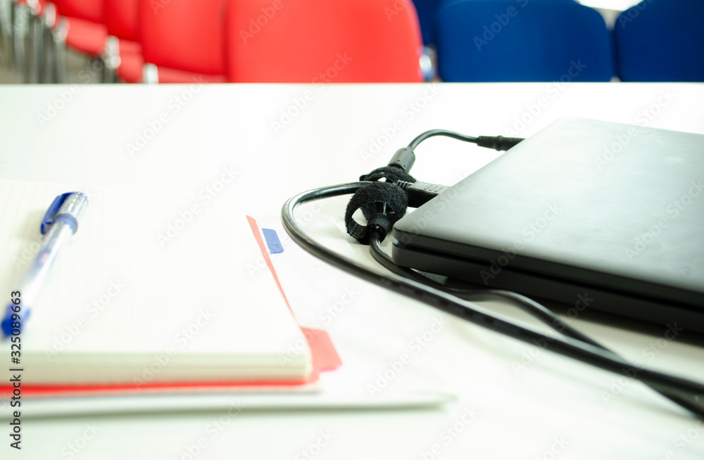 Before a conference. Preparing a report. Notebook closeup. Business and studying. Before a conference. Preparing a report. Notebook closeup. Business and studying.