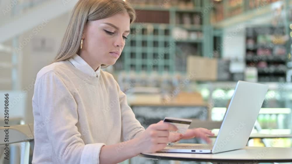 Young Woman with Online Payment Failure on Laptop 
